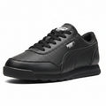 Pair of black sneakers on a light gray background