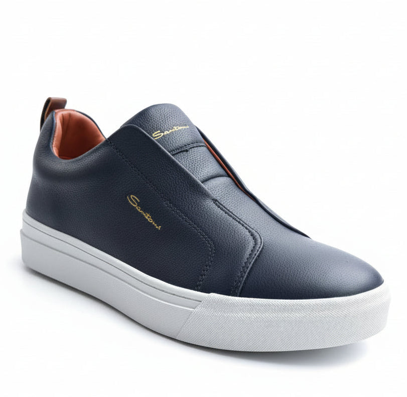 Navy slip-on sneaker with white sole on a white background