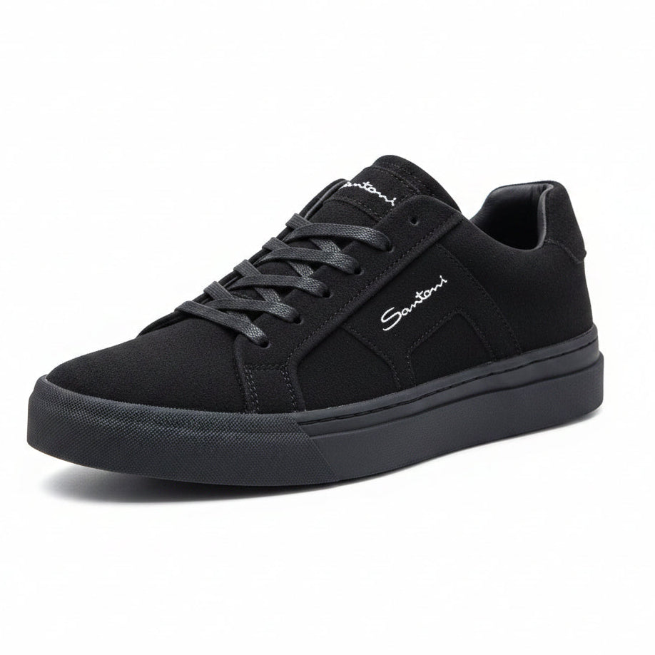 Black sneaker with brand logo on a white background